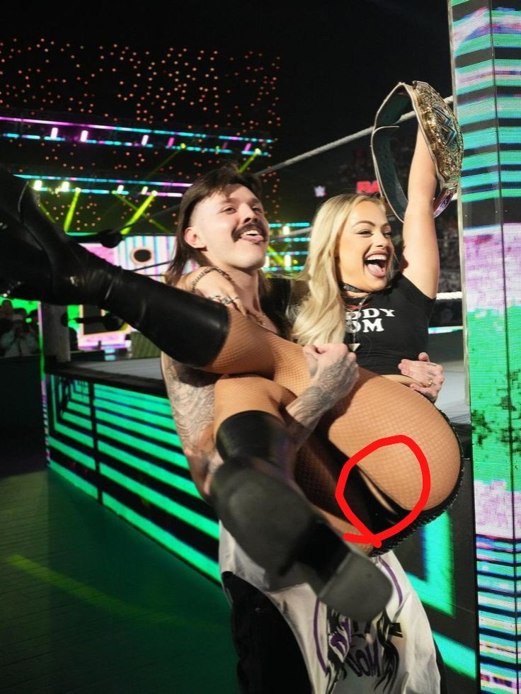 Chaos in the Ring: Dominik Mysterio Lifts Liv Morgan and Her Skirt Tears Mid-Move!